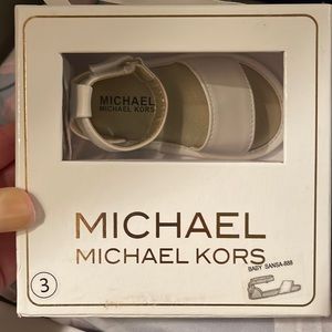 Never worn Michael Kors size 3 crib shoes
